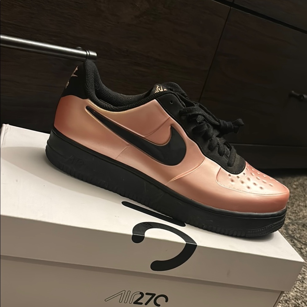 Nike Pink and Black Sneakers with Leather Upper and Perforations